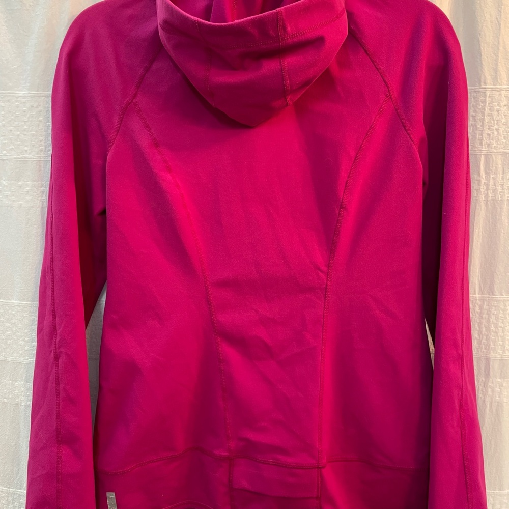 Zella hooded workout top. 1/2 zip. Thumb holes. Stretchy material